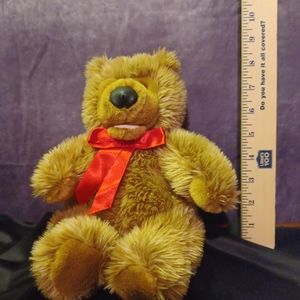 Adorable Teddy Bear with Pink Mouth and Red Bow